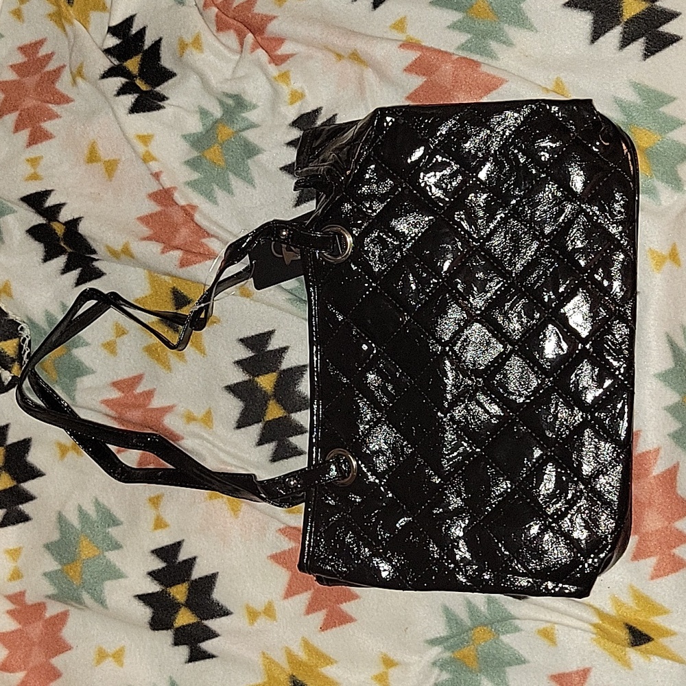 Quilted patent leather handbag
